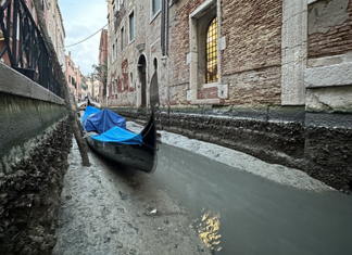 VENICE, KNOWN FOR FLOODING, EXPERIENCES HISTORIC LOW TIDES