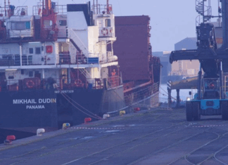 GREENPEACE FRANCE PHOTOGRAPHS URANIUM LOADED ON SHIP FOR EXPORT TO RUSSIA
