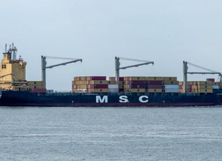 CREW RESCUED AFTER ABANDONING SMALL MSC BOXSHIP OFF VIETNAM