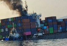 IRAN CLAIMS CONTAINERSHIP HIT MINE AND SANK IN STRAIT OF HORMUZ