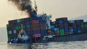 IRAN CLAIMS CONTAINERSHIP HIT MINE AND SANK IN STRAIT OF HORMUZ